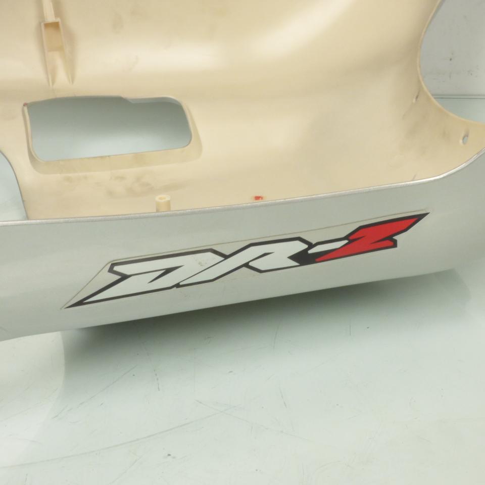 Sabot bas de caisse origine pour scooter Sukida 50 GOS 82223-SBJ-01AS11 / gris
